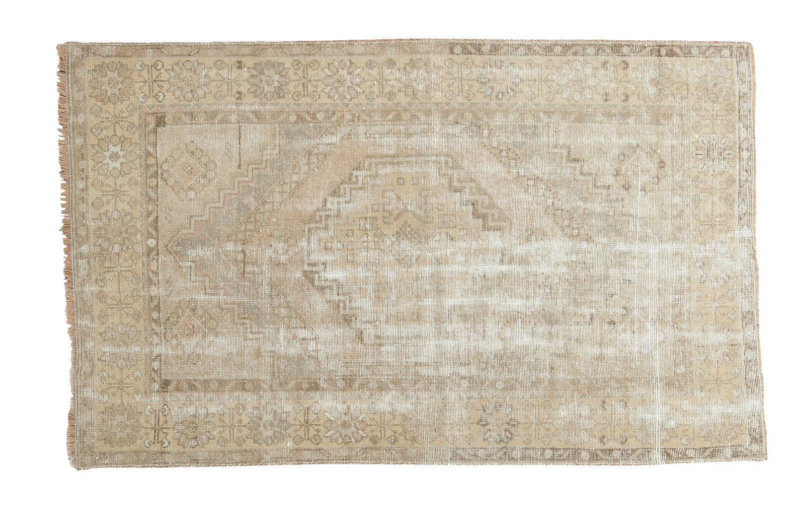 Vintage Oushak distressed rug, faded octagonal medallion, geometric borders, calm earth tones.